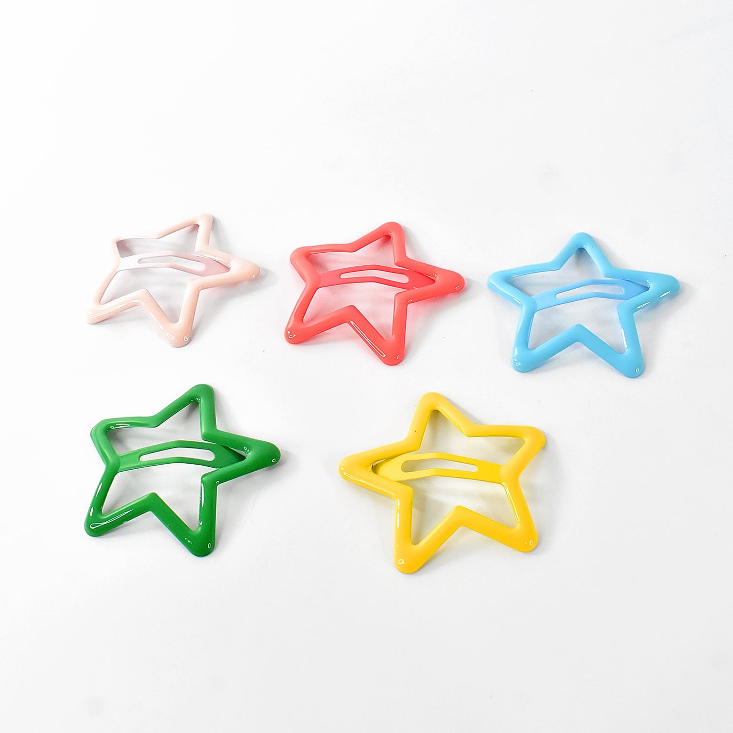 Set of 10 metal star-shaped hair clips by Wukusy, featuring shiny silver finish and secure snap closure, perfect for hair styling.