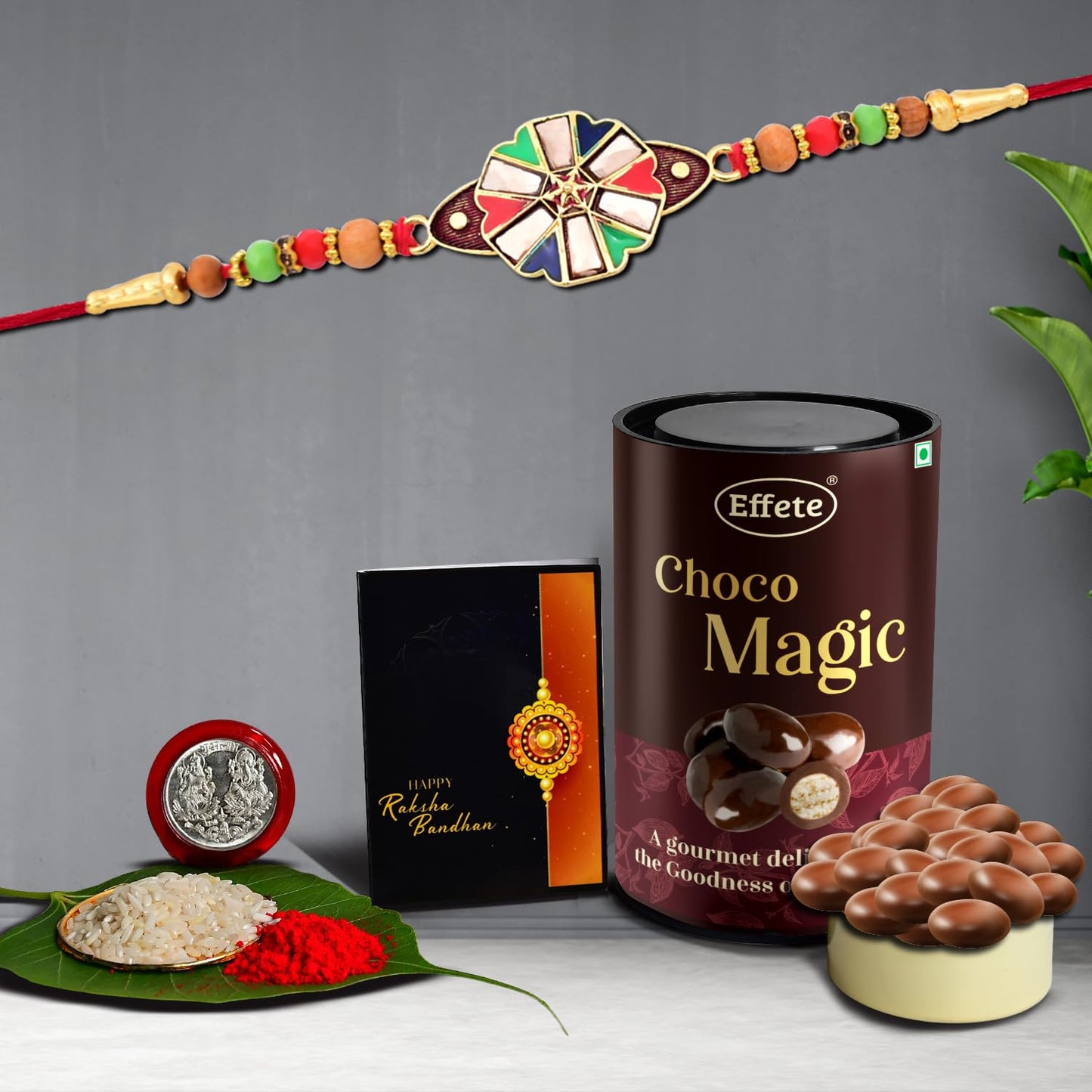 Wukusy designer Rakhi set for brother with Choco Magic 96gm, featuring intricate Rakshabandhan Rakhis in vibrant colors.