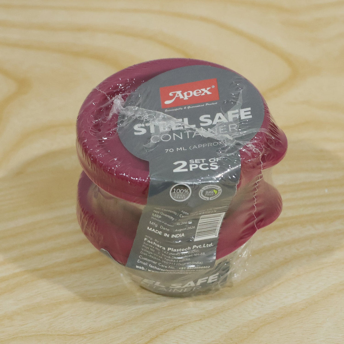 Two Wukusy Apex stainless steel food containers with lids, 70 ml capacity, ideal for snacks and dips, shown with lids on.