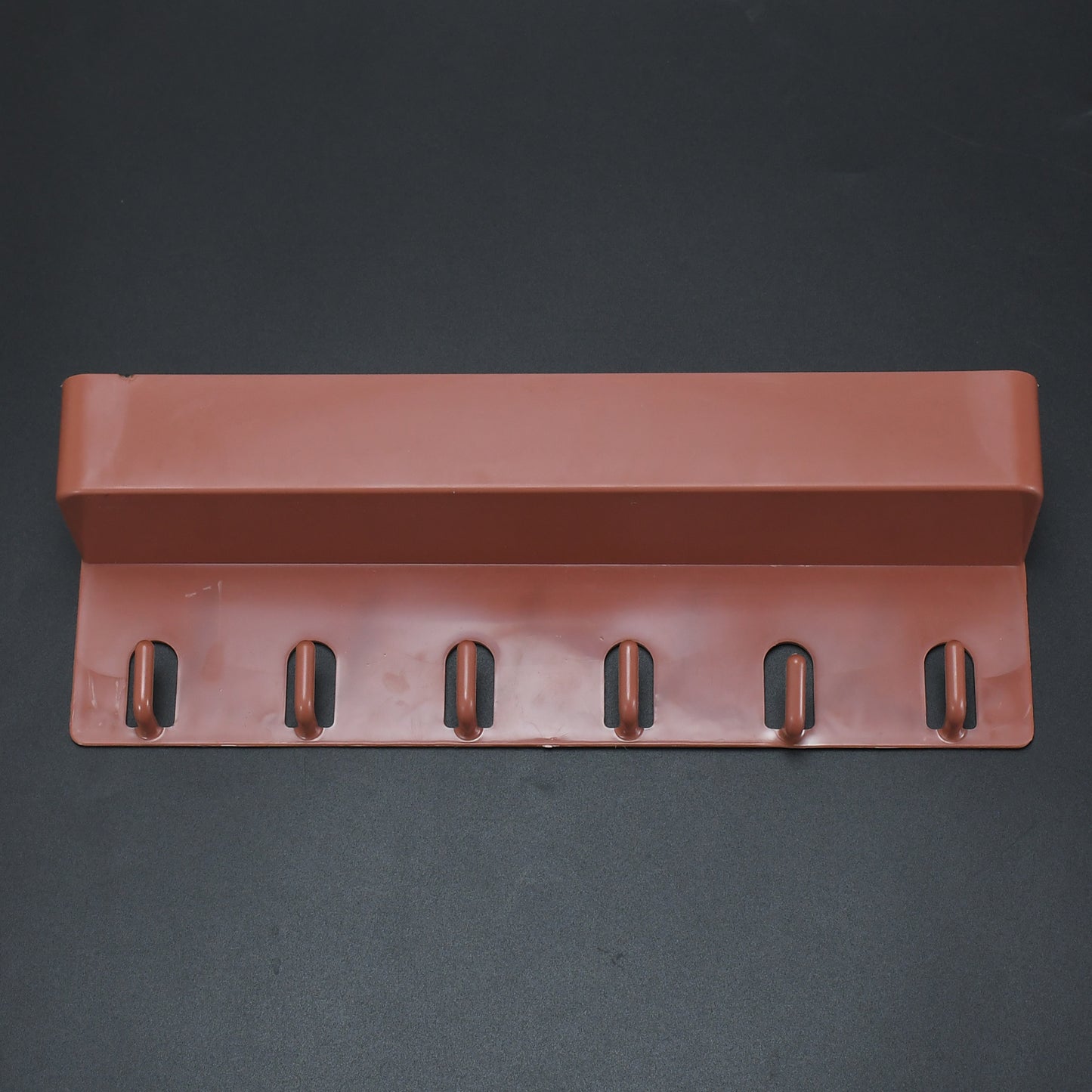 Wukusy 4612 key holder with six hooks on a stand, designed for home or bathroom use, made of durable metal with a sleek finish.