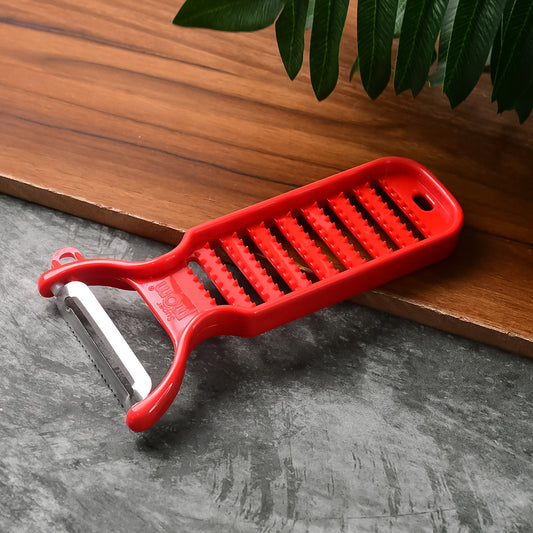 Wukusy Supermom ginger grater and peeler, compact kitchen tool with stainless steel grater and ergonomic handle for fresh ginger.