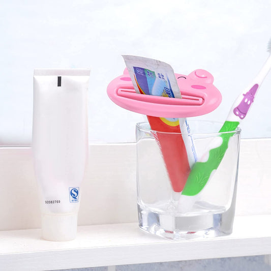 Wukusy 3.5-inch animal-shaped toothpaste tube squeezer for extruding toothpaste, facial wash, or tomato sauce from tubular containers.