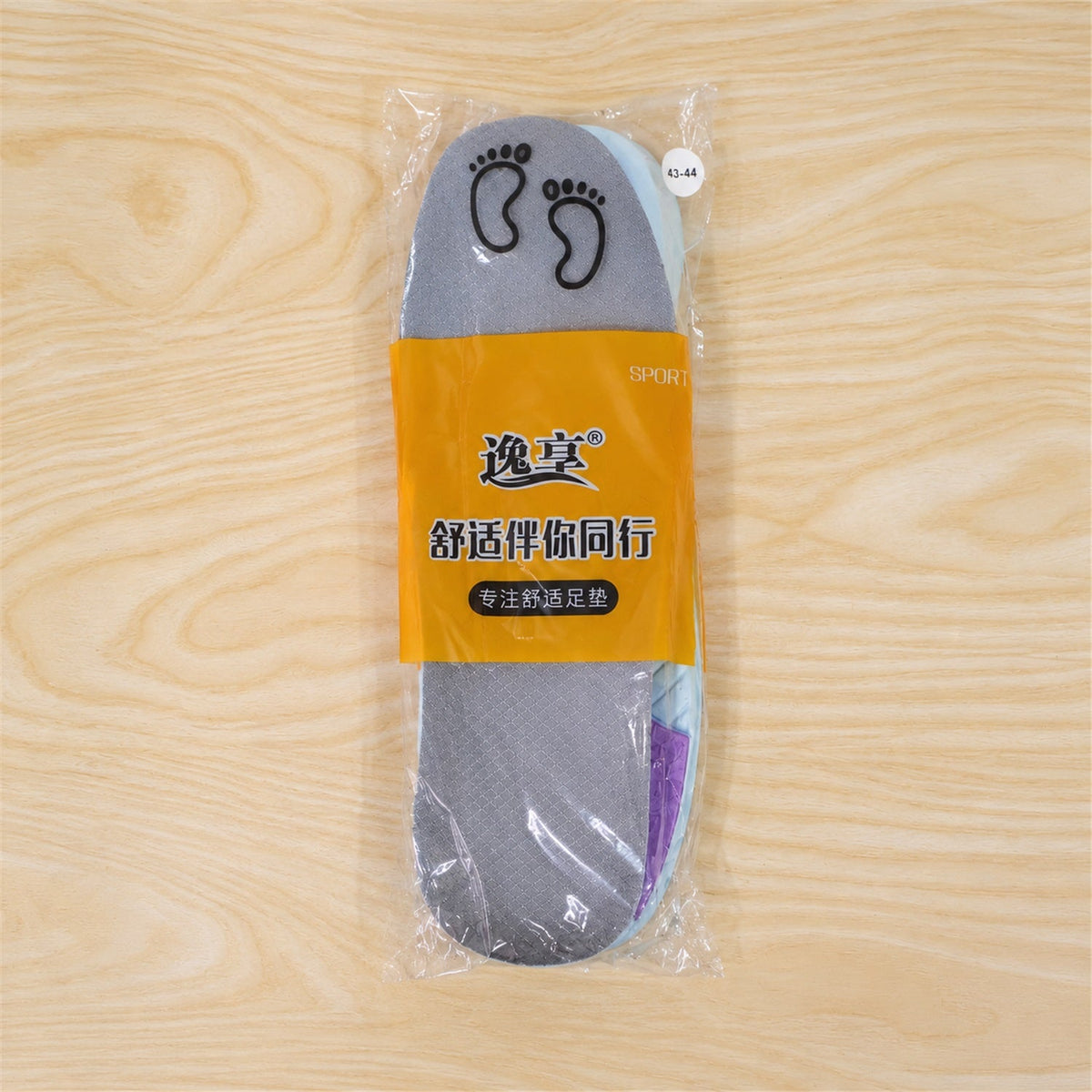 Pair of Wukusy cushioned arch support shoe insoles in size 43-44, showing soft padding and ergonomic design for comfort.