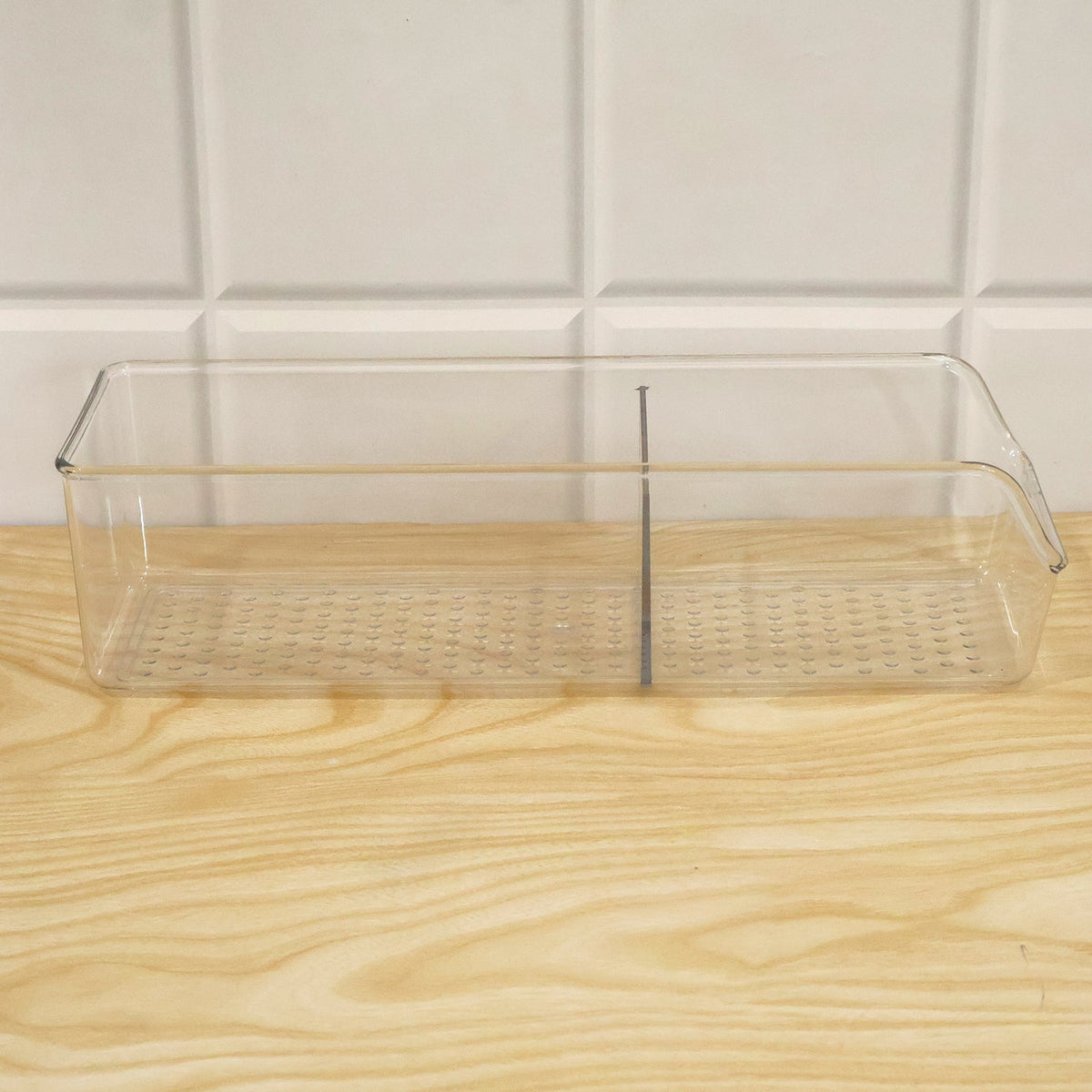 Wukusy clear plastic storage organizer box with dividers for kitchen, showing multiple compartments for organizing small items.