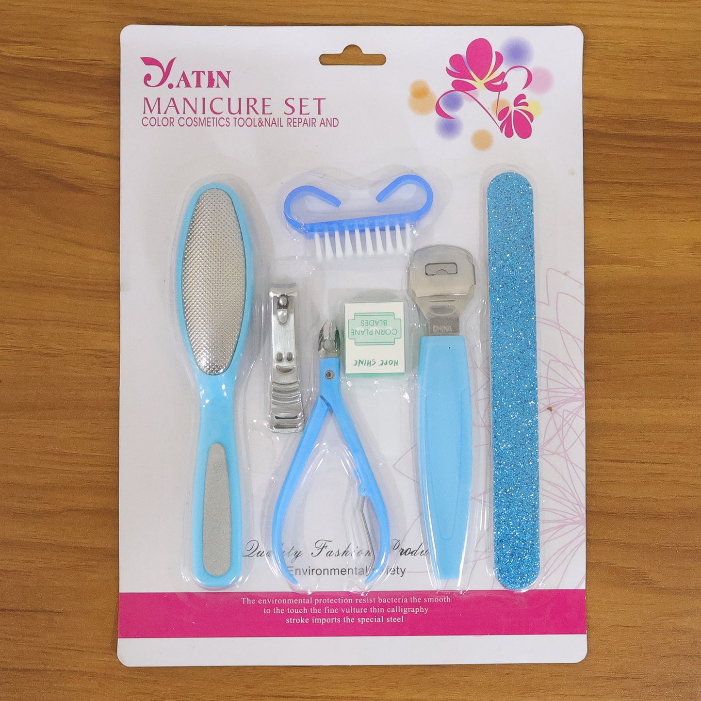 Wukusy 7-in-1 pedicure and manicure foot care tool kit with various grooming tools for foot and nail care.