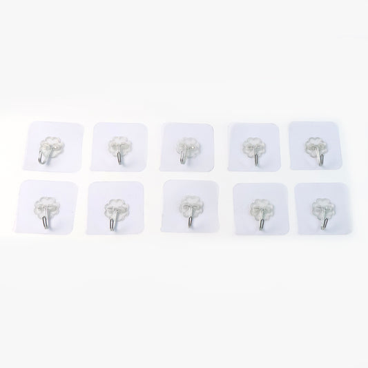 Set of 10 heavy-duty Wukusy flower adhesive wall hooks mounted on a wall for home organization and decor.