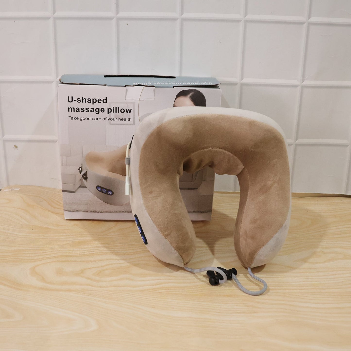 Wukusy U-shaped electric neck massage pillow with cordless design, showing the gray travel neck massager on a white background.