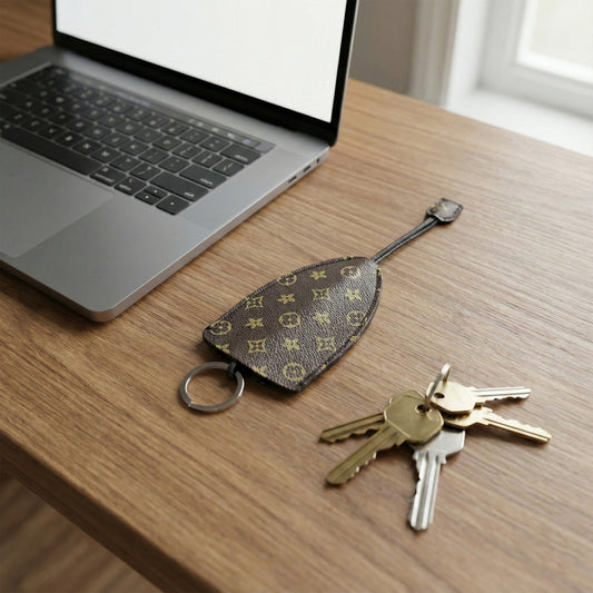 Wukusy premium designer-style keyholder key case with multiple compartments, black leather exterior and sleek design.