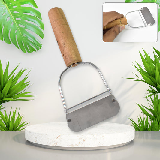 Wukusy wooden handle metal vegetable cutter peeler and slicer, showing the ergonomic handle and sharp blades for kitchen prep.