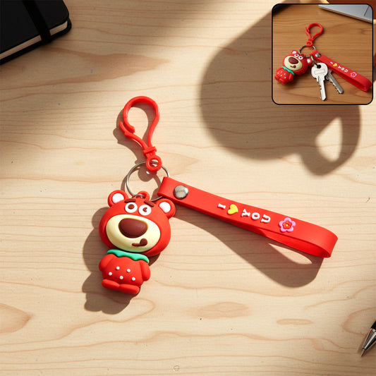 Cute cartoon bear figure keychain by Wukusy featuring a small, colorful bear design with a metal keyring attachment.