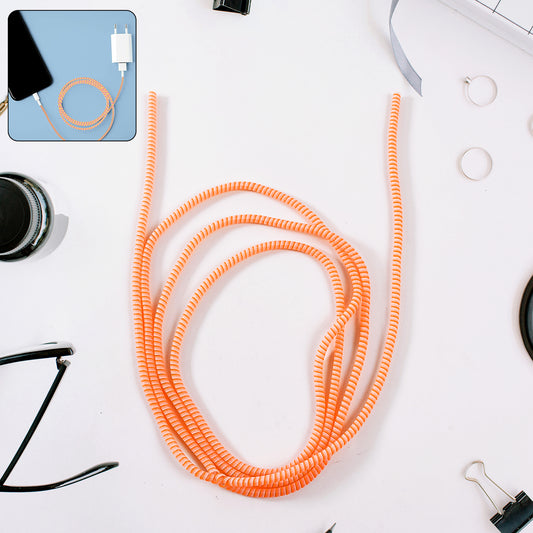 Flexible spiral cable protector sleeve by Wukusy for mobile accessories, shown coiled around a charging cable.
