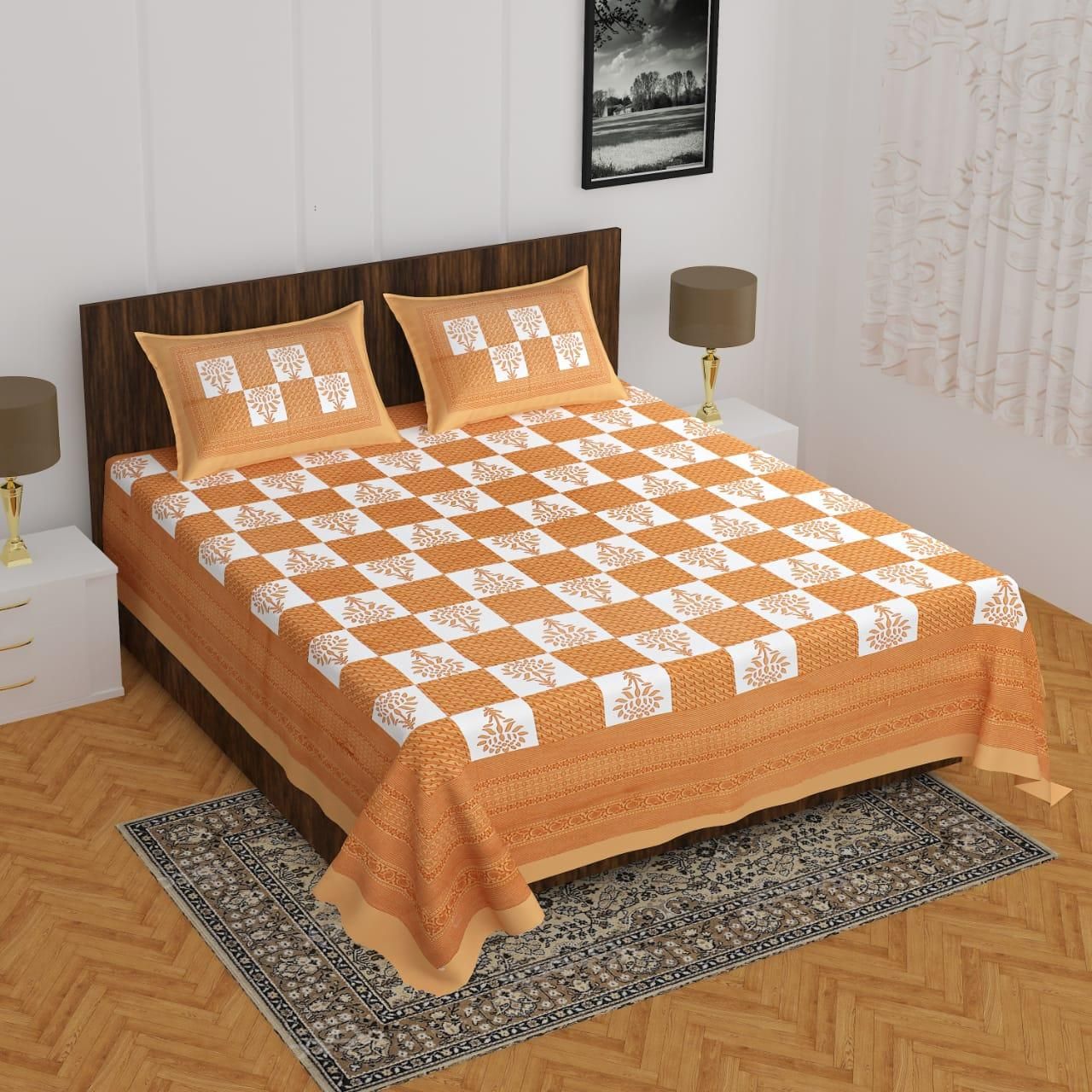 Cotton printed double bedsheet with colorful floral design, soft fabric, and smooth texture for comfortable bedroom decor.