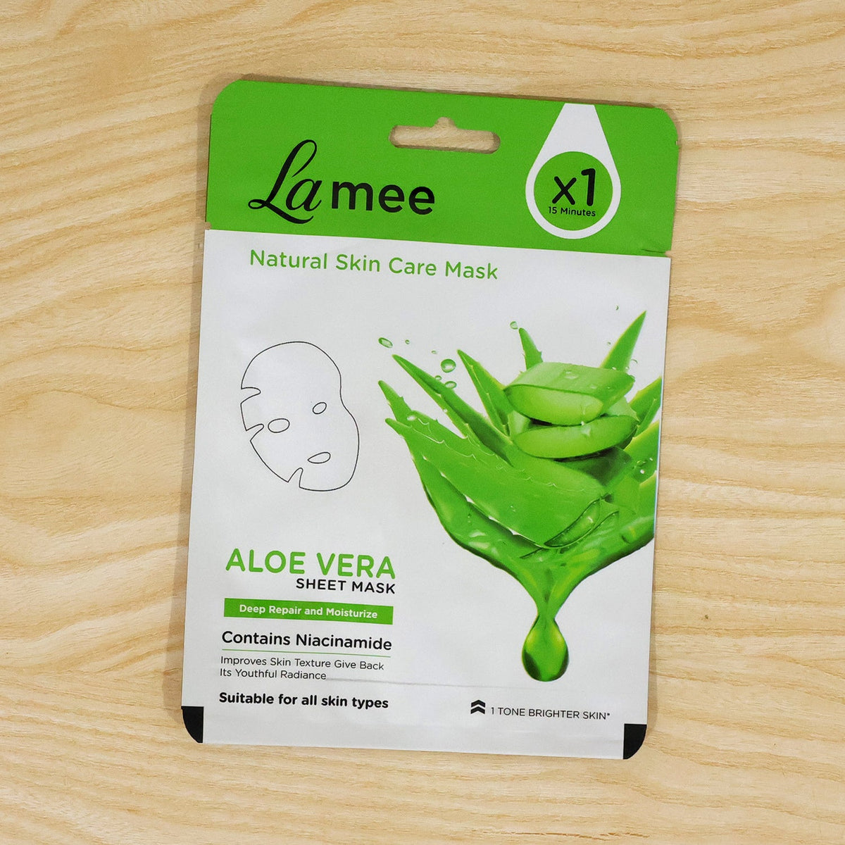 Wukusy Aloe Vera facial sheet mask with niacinamide for moisturizing and soothing skin care, shown on a white background.