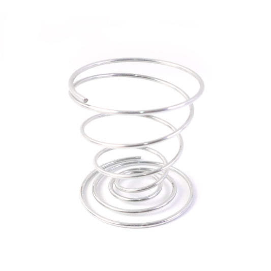 Stainless steel spring egg cup holder by Wukusy, designed to securely hold a boiled egg in a kitchen setting.