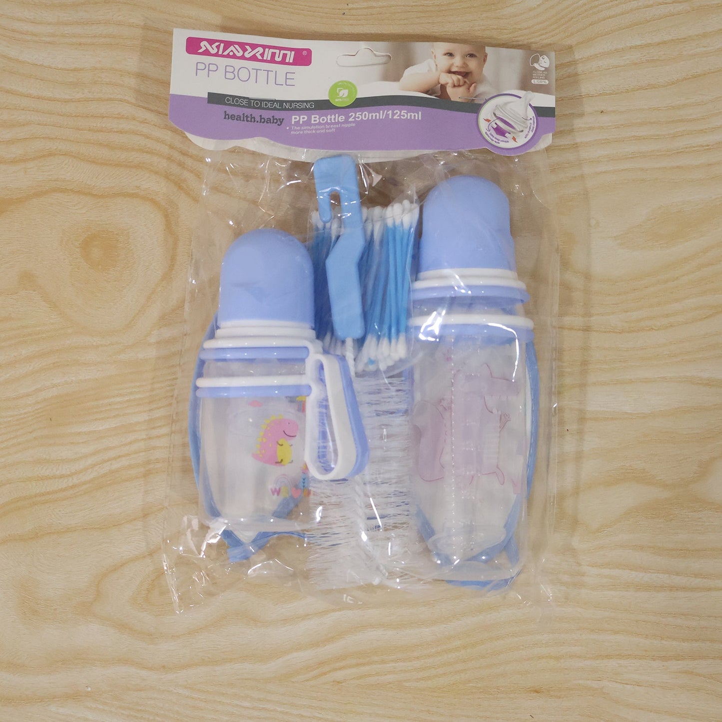 Plastic Baby Feeding Bottle Set With Bib Brush And Cotton Buds (1 Set)