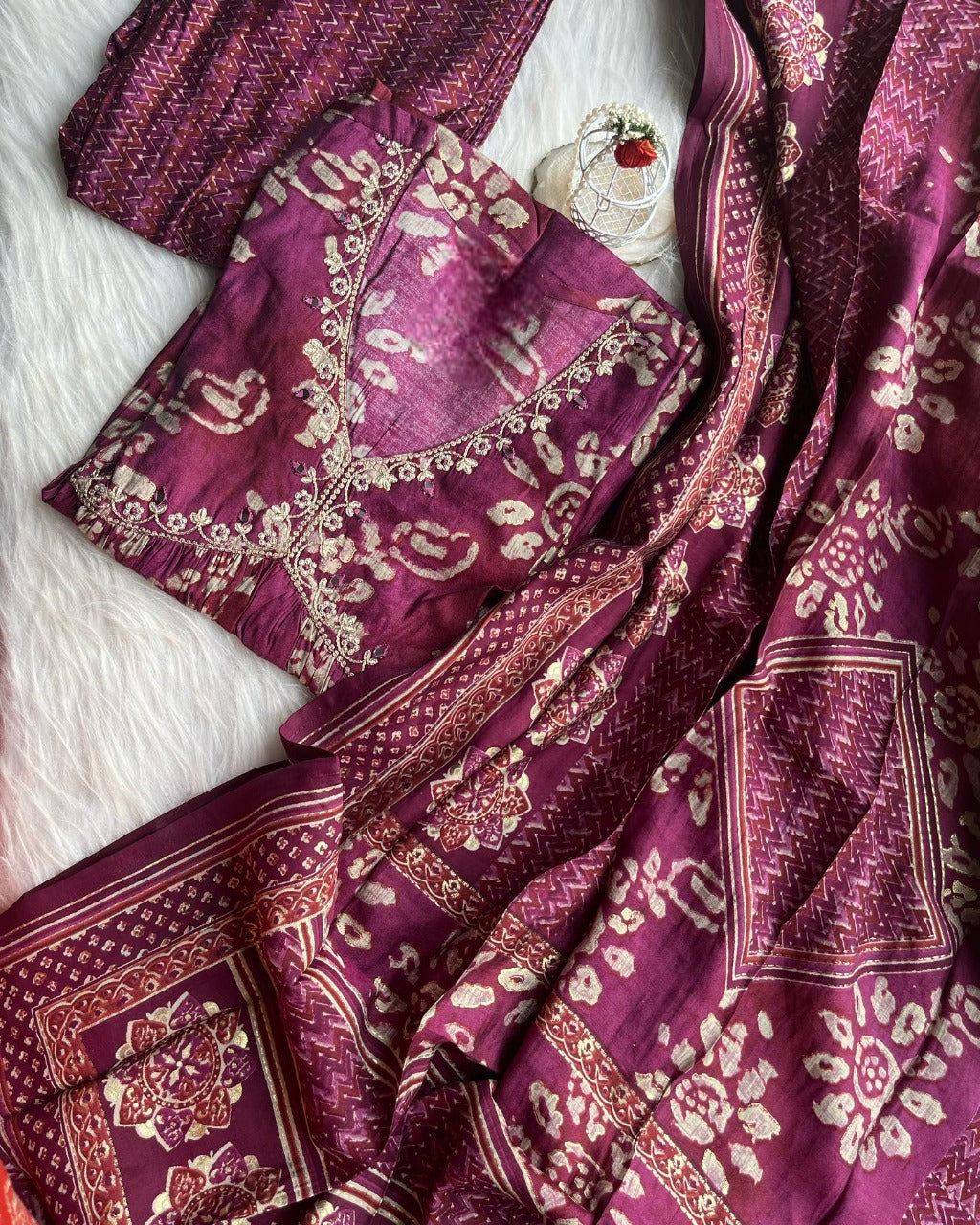 Maroon hotseller salwar suit from Drpshippr with intricate embroidery, traditional style, and matching dupatta.