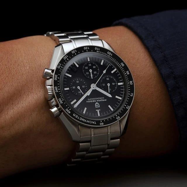 Men's silver stainless steel strap watch from Drpshippr's men's collection, featuring a sleek round dial and metal band.