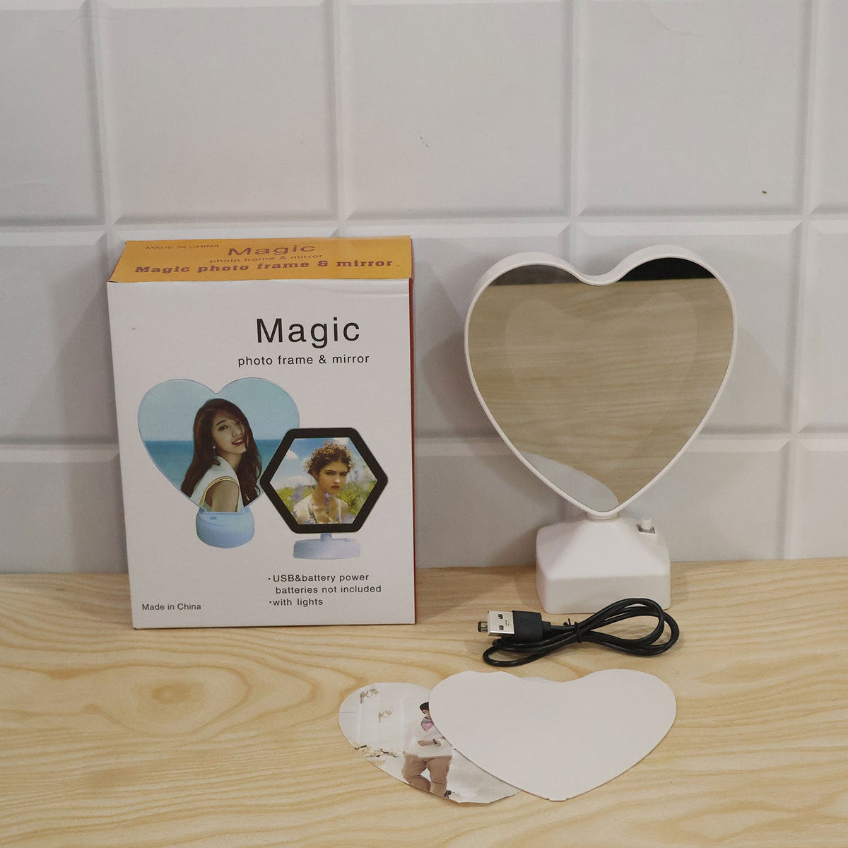 Heart-shaped LED mirror photo frame with warm light, perfect for tabletop home decor, by Wukusy.