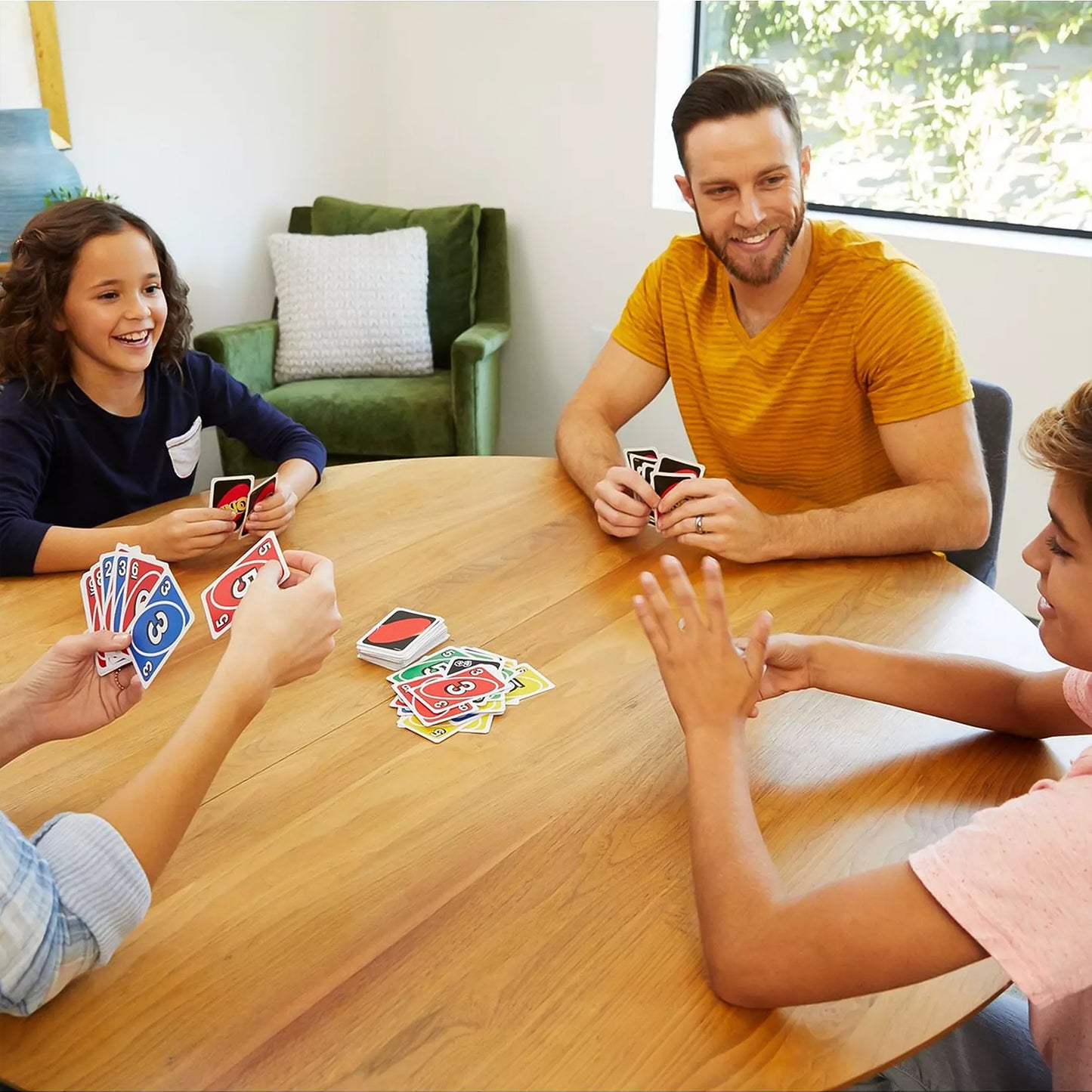 Wukusy Gno Pixar Anniversary Card Game with 112 colorful toy cards featuring Pixar characters and artwork.