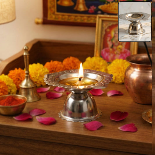 Stainless steel traditional Puja diya stand with multiple holders, designed for religious lighting ceremonies.