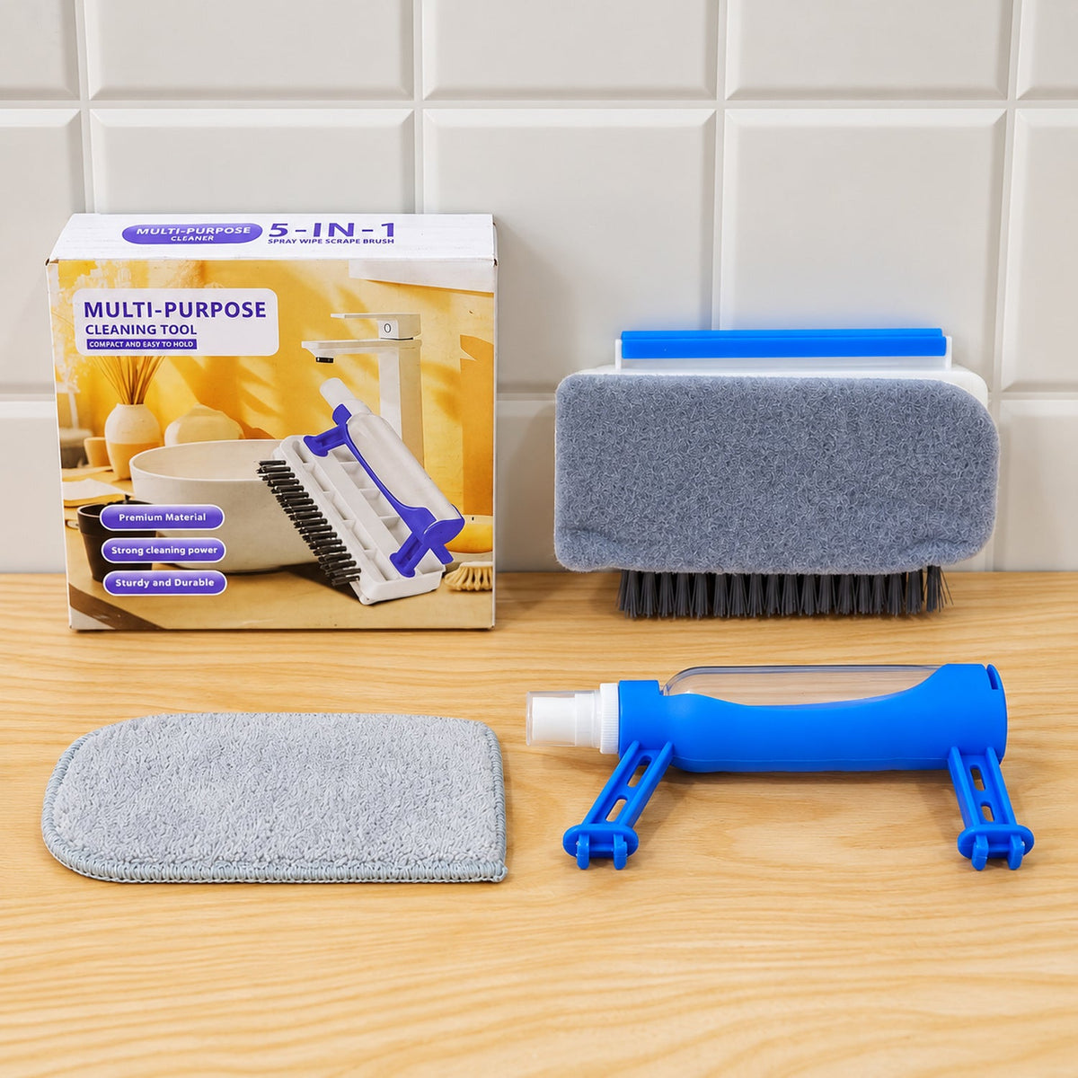 Wukusy 5-in-1 multipurpose cleaning brush with spray, squeegee, and wiping pad for versatile cleaning tasks