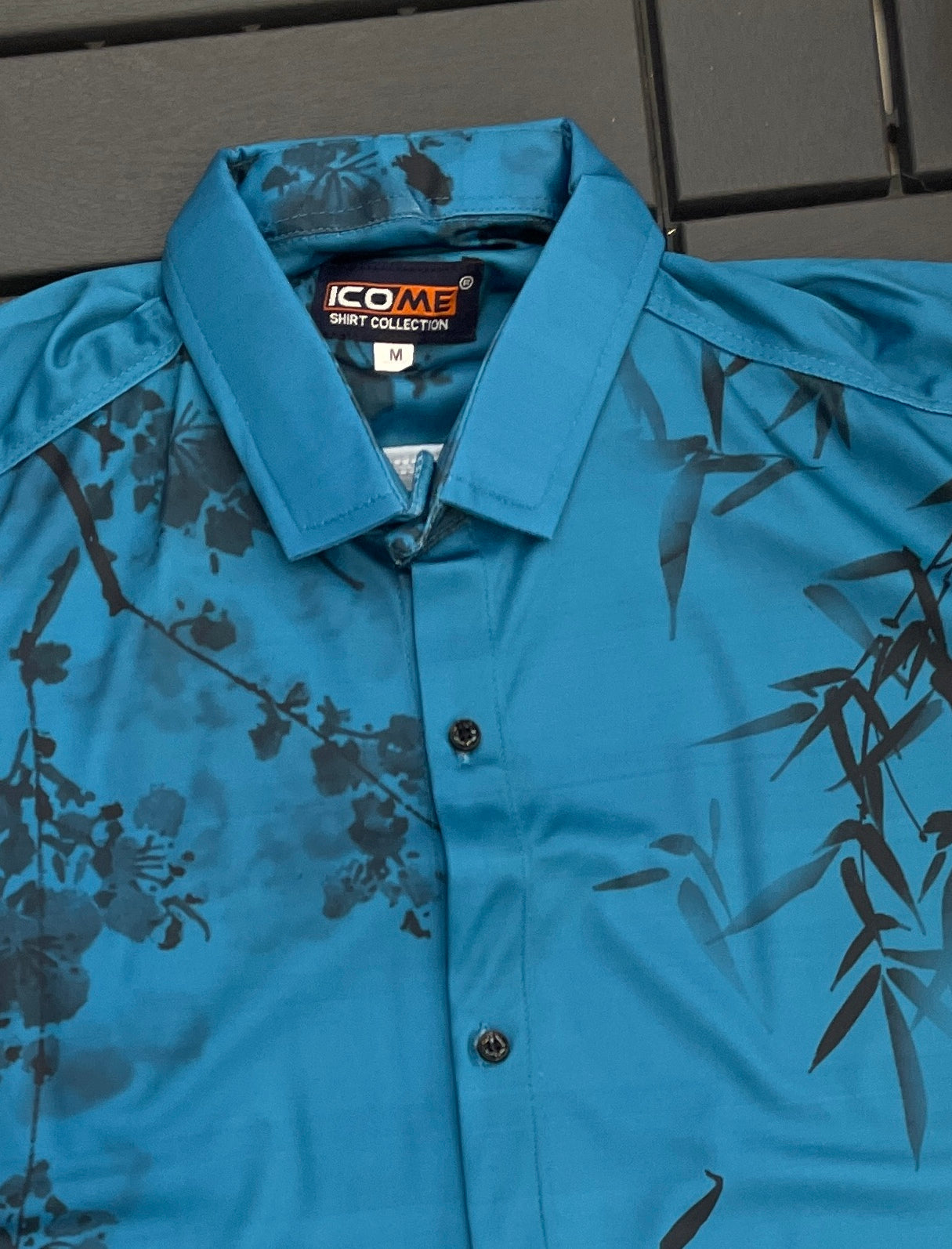 Printed half-sleeves stylish men's shirt from Drpshippr with vibrant patterns and casual fit, displayed on a hanger.