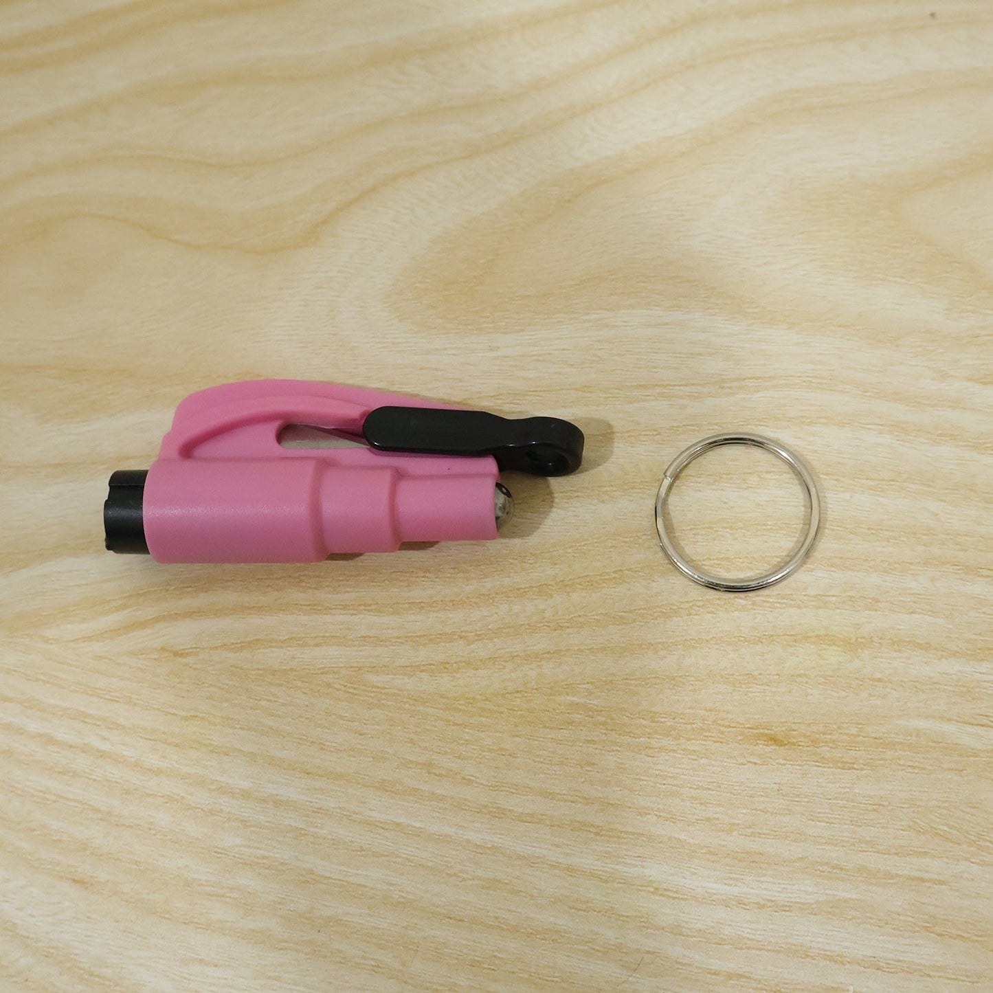Wukusy keychain car window glass breaker and seat belt cutter tool with compact design for emergency escape.