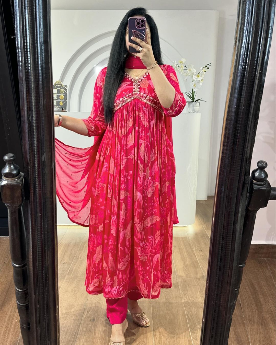Red embroidered suit from Drpshippr, featuring intricate embroidery and traditional design, styled for elegant occasions.