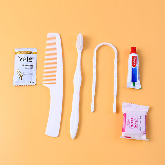 Wukusy 6-in-1 hotel guest toiletry kit with travel-sized bottles, comb, and personal care essentials in a compact set.