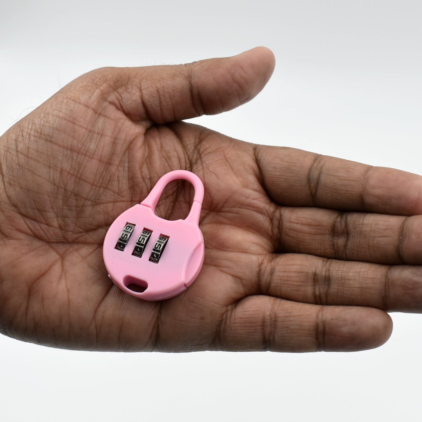 Wukusy 6108 3-digit zipper lock with zipper tool, used for security purposes on various zipper materials, close-up view.