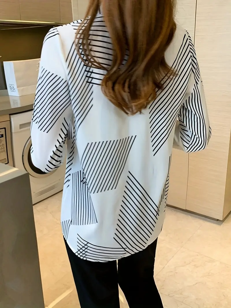 Woman wearing a printed cotton silk long sleeve collar neck tunic shirt from Drpshippr's men's collection