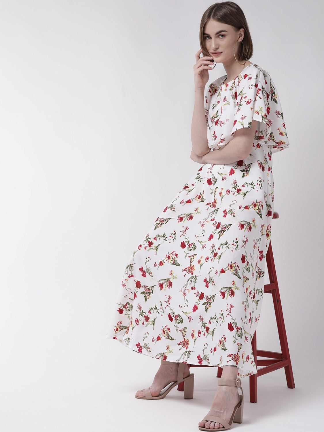 Women’s white cape sleeve maxi dress from Drpshippr’s Women's Collection, featuring a flowing design and elegant cape sleeves.