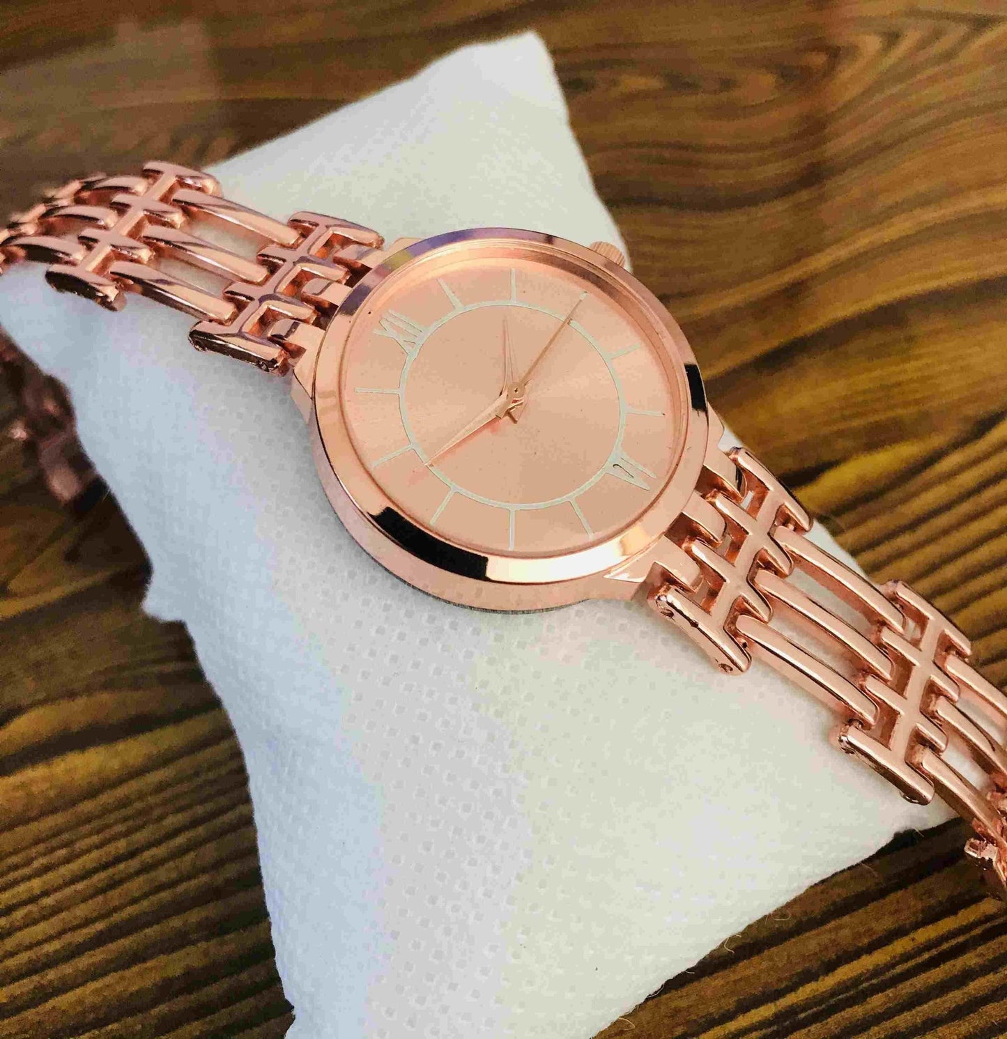 Women's stainless steel analog watch from Drpshippr's men's collection, featuring a sleek design with a round dial and metal band.