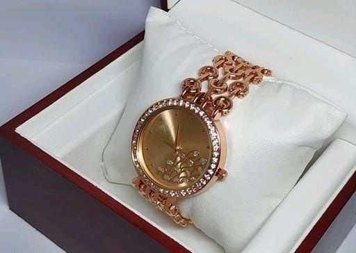 Women's stainless steel analog watch from Drpshippr's Vol-56 collection, featuring a sleek design and classic round dial.