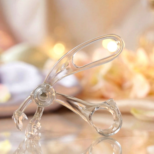 Wukusy Classic Plastic Eyelash Curler with black handle and metal clamp for curling eyelashes effectively.