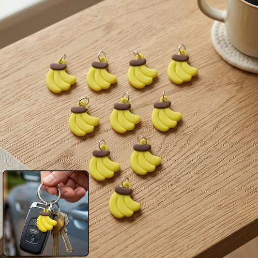 Set of 10 Wukusy cute banana-shaped bag charm keychains with colorful, playful designs for accessories and decoration.