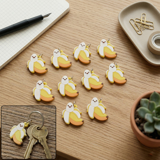 Set of 10 cute cartoon banana bag charm keychains by Wukusy, featuring playful yellow banana designs for bags and keys.