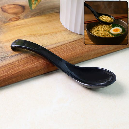 Black plastic soup spoon with deep bowl, Wukusy home and kitchen utensil for serving soups and broths.