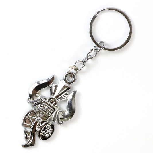 Silver keychain featuring Trishul, Damru, and Shiv symbol by Wukusy, showcasing intricate religious motifs on a keyring.