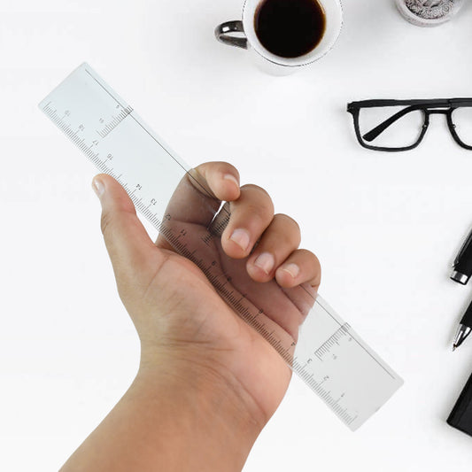 Transparent 20 cm plastic ruler by Wukusy, ideal for office and school use, showing clear measurement markings on smooth surface.