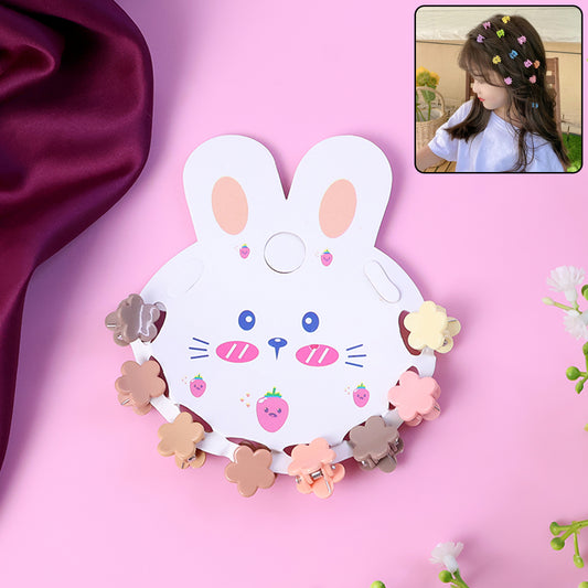 Set of Wukusy flower-shaped mini hair claw clips in pastel colors, perfect for securing small sections of hair.