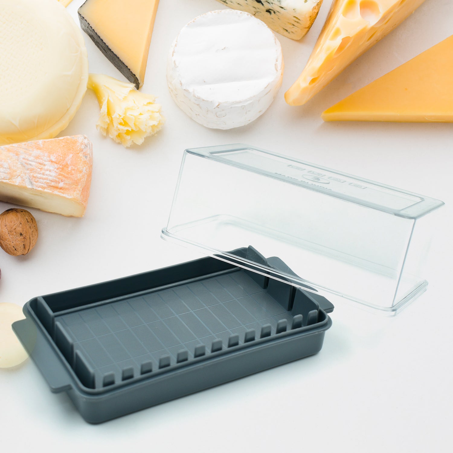 Wukusy butter storage box with slicer, transparent plastic organizer with lid for easy cutting and storing butter in kitchen.