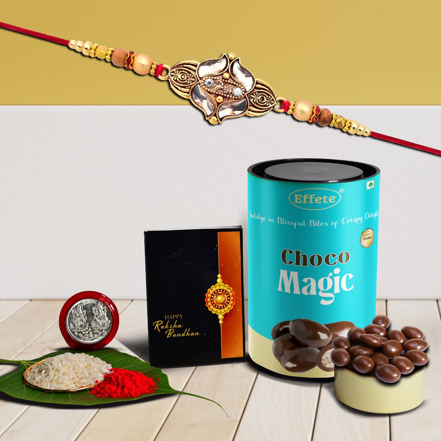 Wukusy Rakhi combo featuring a stylish handmade Rakhi with chocolate for brother, set of 1 with gift packaging.