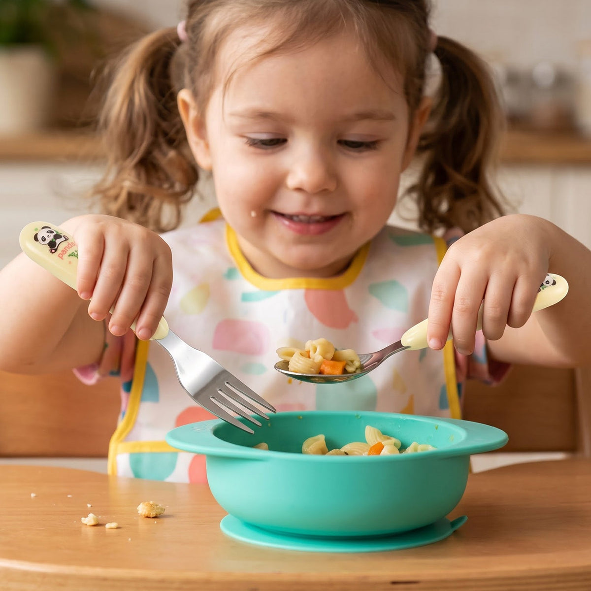 Kids cartoon spoon and fork set with easy grip handles, Wukusy 2-piece feeding utensils for children.