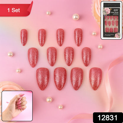 Set of Wukusy glitter press-on false nails in mixed colors and designs, showcasing shiny, stylish nail art for easy application.