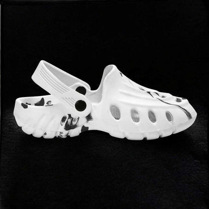 Men's black and white clogs by 16069, showcasing comfortable slip-on footwear for casual wear.