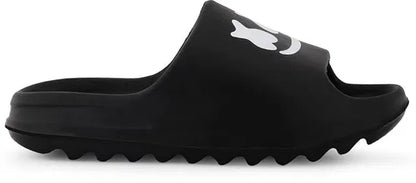 Black Smile Slides slippers by 1765 featuring a casual slip-on design with a smile motif on the black rubber soles.