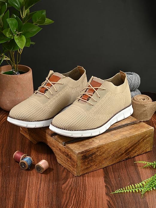 Beige Kastava men's slip-on sneakers with casual design and rounded toe, ideal for comfortable everyday wear.