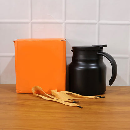 Wukusy 800ml insulated thermos flask with handle and strap, showing a sleek stainless steel design with a secure lid and carrying strap.