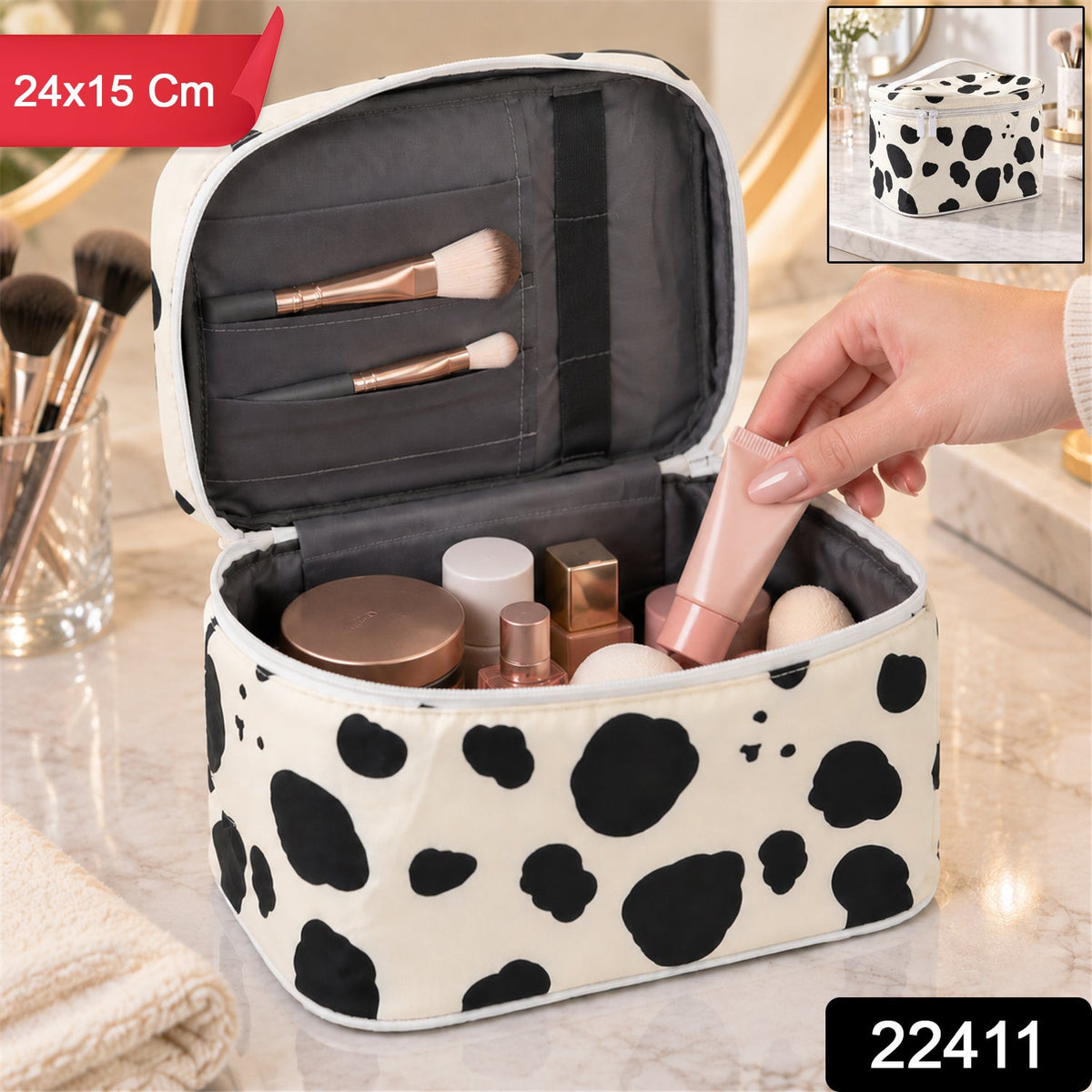 Wukusy spotted makeup zipper pouch with carry handle, compact travel organizer in black and white pattern, 24x15 cm.